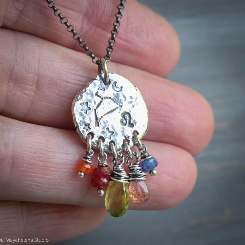 il_fullxfull.7206213909_5td0.jpg Written in Stars - Leo - Zodiac Seal Peridot Garnet Sterling Silver Necklace