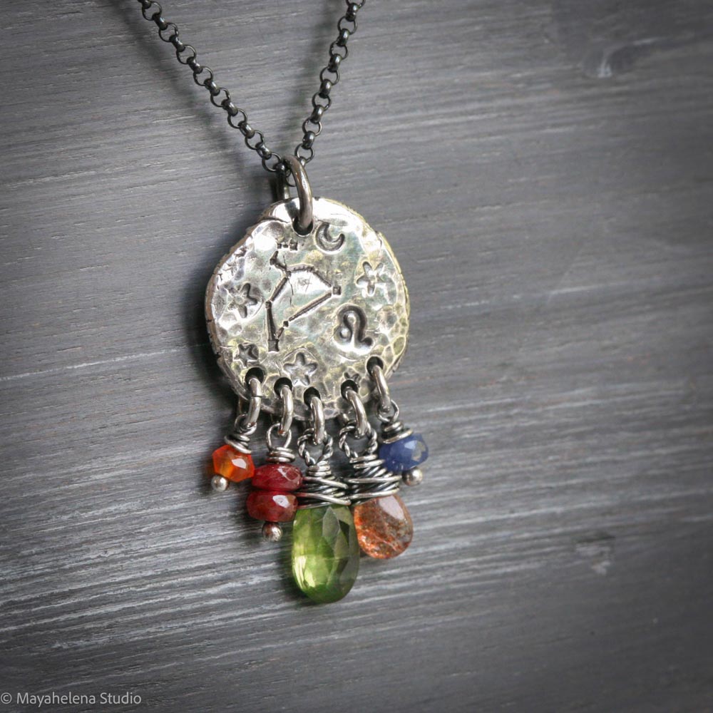 il_fullxfull.7206213911_1g3l.jpg Written in Stars - Leo - Zodiac Seal Peridot Garnet Sterling Silver Necklace